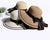 Elegante sombrero de sol de verano para mujer: detalle de lazo negro grande con paja plegable y ala ancha