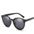 Lujosas gafas de sol polarizadas redondas para mujer